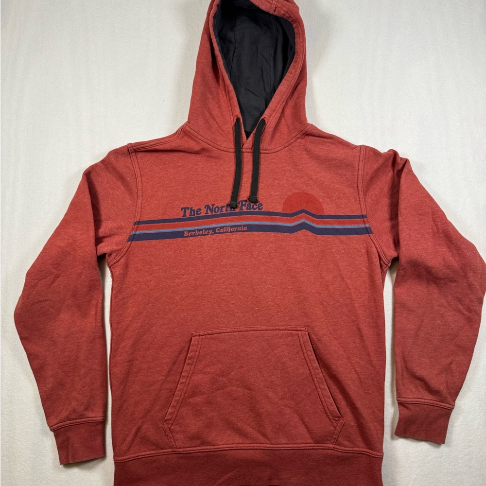 The North Face Men’s Rust Red Pullover Hoodie with Striped Chest Graphic